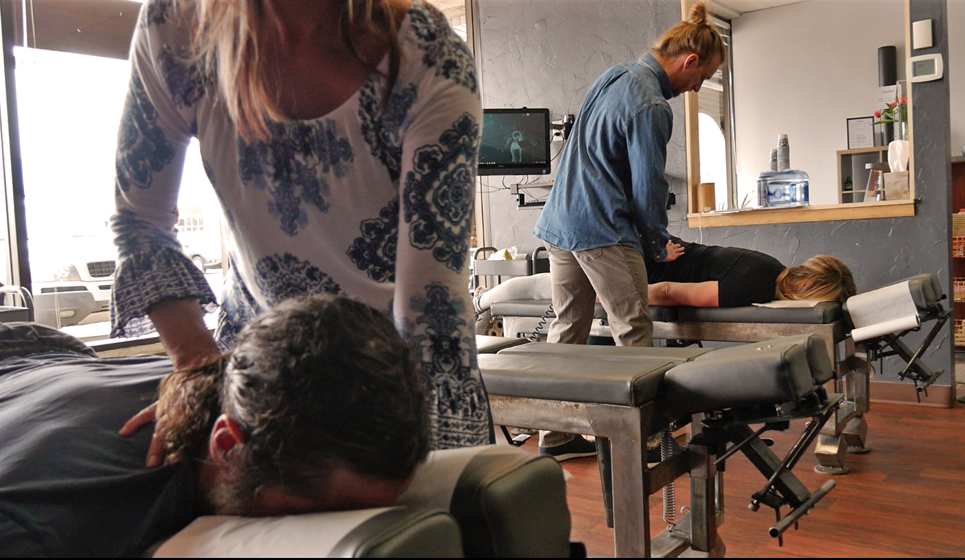 Dr. Duff performing a chiropractic adjustment in the Boulder office